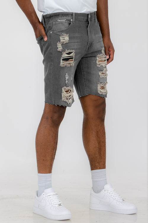 Pantalones cortos vaqueros desgastados para hombre